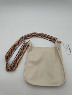 Brand new with tags attached and from a smoke free home. NWT Adorned Ivory Vegan Leather Messenger Bag With Guitar Strap that has never been worn and has no damages or stains. Detachable and interchangeable strap. Leather Messenger Bag, Guitar Strap, Leather Messenger, Messenger Bag, Bags Handbags, Vegan Leather, Shoe Accessories, Guitar, Bag Lady