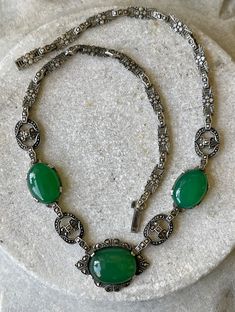 Circa 1920s Beautiful Authentic Art Deco Sterling Silver Green Chrysoprase Marcasite Vintage Antique Necklace Art Deco Jewelry Measeures aprox 17 inches around Vintage Oval Jade Necklace, Vintage Jade Necklace For Formal Occasions, Antique Green Oval Necklace, Victorian Oval Green Necklace, Vintage Green Emerald Necklace For Formal Occasions, Vintage Green Jade Necklaces, Ornate Green Oval Necklaces, Vintage Green Oval Necklace, Antique Green Gemstone Necklace