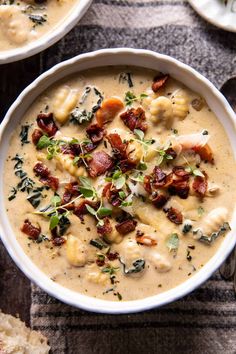 two bowls of soup with bacon, cheese and spinach