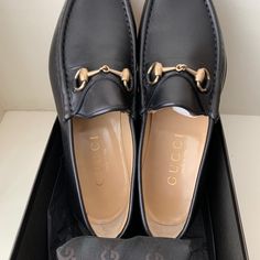 Brand New And Unworn Gucci Men’s Loafers Size 42.5 E (Wide). Made In Italy Black Leather With Gold Buckles. Comes With Box & Shoe Bag As Shown. Gucci Luxury Slip-on Loafers, Designer Slip-on Loafers With Leather Lining, Designer Business Loafers With Branded Heel Counter, Designer Loafers With Leather Lining For Galas, Leather Horsebit Loafers, Luxury Gucci Dress Shoes For Galas, Designer Calf Leather Loafers With Horsebit Detail, Gucci Luxury Leather Dress Shoes, Luxury Horsebit Loafers With Round Toe