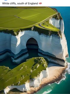 an aerial view of the white cliffs, south of england with green grass growing on them