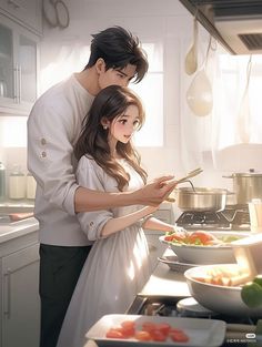 a man and woman are cooking in the kitchen, one is looking at her phone