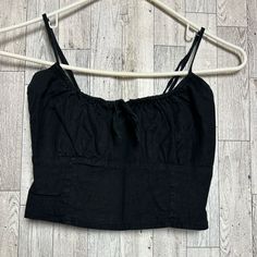 A Gently Used Crop Top! There Is No Damage (Rips,Snags,Stains,Etc) Reasonable Offers Accepted Instantly! Bundle & Save! Bundle Deals Will All Arrive In The Same Package. Items Are Pallet Pulls And May Have Sticker Residue Or Missing The Original Stickers! Products Are Not Used!! Shipping Is By Weight And The Prices Are Preset By The Selling Platform. All Clothing Is Washed Unless They’re New With Tags Then They Are Disinfected. Fitted Black Linen Top, Black Cotton Tops For Spring, Chic Black Cotton Crop Top, Black Cotton Crop Top For Spring, Black Cotton Crop Top For Day Out, John Galt, Black Crop, Linen Blend, Crop Top