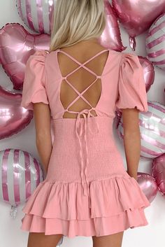 SELF: 56% POLYESTER, 43% COTTON, 1% SPANDEX. LINING: 100% POLYESTER Model Wearing Size Small Color: Baby Pink Textured Material Deep V-Neck Puffed Sleeves Back Lace-Up Detail Smocked Bodice Tiered/Ruffle Hem Mini Length Dress Has Stretch 2.5" Armpit To Sleeve End 23" Armpit To Hemline Video Product Color May Not Be Accurate For Model Size Specs Please Check Size Charts Launched: 12/29/23 Spring Party Puff Sleeve Dress With Smocked Bodice, Cute Mini Dress With Tie Back, Pink Puff Sleeve V-neck Dress With Ruffles, Flirty Puff Sleeve Dress With Smocked Back, Flirty Puff Sleeve Dress With Smocked Bodice For Spring, Flirty Spring Puff Sleeve Dress With Smocked Bodice, Flirty Fitted Puff Sleeve Dress With Smocked Back, Spring Mini-length Puff Sleeve Dress With Smocked Back, Cute Ruffled Puff Sleeve Dress