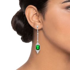 Dazzling with green and white cubic zirconia gemstones, these sterling silver drop earrings lend an elegant touch to your wardrobe. Dazzling with green and white cubic zirconia gemstones, these sterling silver drop earrings lend an elegant touch to your wardrobe. Metal: sterling silver Backings: post Packaging: boxed Finish: polished Length: 57 mmSTONE DETAILS Stone type: green & white cubic zirconia Total weight: 3 ct. Shape: baguette cut, round Gemstones may have been treated to enhance their appearance. Special care may be required. Please visit our Gemstone Treatment & Special Care Guide for more information. Please note, due to the high value of this item, a signature may be required upon delivery. Size: One Size. Gender: female. Age Group: adult. Green Earrings With Pave Setting As A Gift, Green Pave Setting Fine Earrings, Green Sterling Silver Luxury Diamond Earrings, Luxury Green Diamond Earrings In Sterling Silver, Luxury Green Sterling Silver Diamond Earrings, Green Diamond Earrings With Diamond Accents, Green Diamond Drop Earrings With Accents, Green Cubic Zirconia Diamond Drop Earrings, Elegant Green Jewelry With Pave Setting