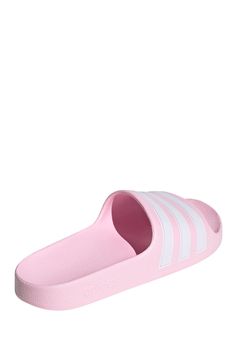 These kids' shower-friendly sandals have a one-piece moulded EVA upper and a plush Cloudfoam footbed that's soft and comfortable on tired little feet. Iconic 3-Stripes show off adidas DNA. . Open toe. 3-stripes print. Slip-on. Molded cushioned footbed. Imported Manmade upper and sole Pink Non-slip Synthetic Slippers, Comfortable Pink Summer Slippers, Pink Synthetic Slippers For The Beach, Pink Synthetic Beach Slippers, Comfortable Pink Flip Flops, Comfortable Pink Open Toe Slides, Comfortable Pink Synthetic Sandals, Pink Synthetic Sandals, Adidas Slides For Swimming In Summer