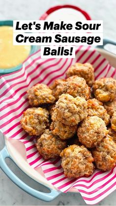 a bowl filled with meatballs next to some dipping sauce