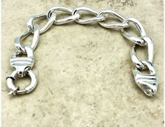 Indulge in timeless elegance with our 925 Sterling Silver 7.5" Curb Link Bracelet. Featuring a sturdy yet stylish large spring ring clasp, this lightweight, hollow piece is expertly stamped with a 925 seal of authenticity. Elevate any outfit with this stunning and versatile accessory! Satisfaction Guaranteed! Anniversary Silver Chain Bracelet With Solid Link, Sterling Silver Bracelet With Lobster Clasp For Formal Occasions, Classic Chain Bracelet With Sterling Silver Clasp For Anniversary, Silver Polished Finish Chain Bracelet For Anniversary, Formal Sterling Silver Bracelet With Lobster Clasp, Metal Bracelet With Lobster Clasp For Anniversary, Sterling Silver Bracelet With Polished Finish For Anniversaries, Polished Sterling Silver Bracelet For Anniversary, Metal Bracelets With Lobster Clasp For Anniversary