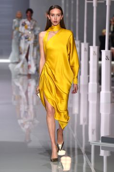 #Mustard double #satin #silk #asymmetric neck-tie #dress. #readytowear#rtw#elegance#femininity Asymmetric Gown, Dress Fashion Show, Silk Dress Fashion, Satin Silk Dress, London Fashion Weeks, Yellow Fashion