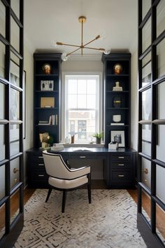 a home office with built in desk and bookcases