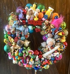 a wreath made out of toys and other items