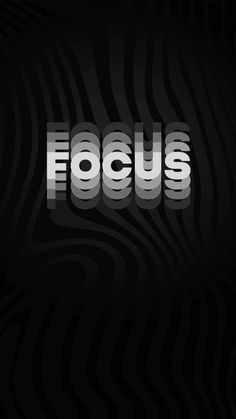 the word focus is made up of silver letters on a black and white striped background