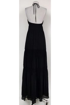 Flirty maxi dress from DVF. Designed with a daring open back and all over pleating on the fabric. A key hole front also adds a chic touch. Style it with wedges and chic sunnies for a vacation ready look that will wow. Size 4 100% polyester Concealed side zipper Lined Halter neckline w/ ties Open back Pleats on fabric Tie at waist Maxi length Bust 29" Waist 26" Shoulder to hem 60" Black Pleated Bodice Dress For Evening, Party Maxi Dress With Pleated Back, Evening Black Maxi Dress With Tie Back, Party Backless Maxi Dress With Pleated Back, Evening Maxi Dress With Pleated Back, Pleated Bodice Maxi Dress For Party, Floor-length Maxi Dress With Pleated Back For Night Out, Formal Pleated Back Maxi Dress, Evening Chiffon Maxi Dress With Pleated Bodice