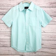 Brand New With Tags, Excellent Condition ! No Flaws Children Place| Boys Short-Sleeve Dress-Up Shirt Size S/P (5-6) Color: Mellow Aqua Perfect Condition ! Still With Tags No Stains Or Rips All Items Ship Same Day Or Next Day ! Ask Any Questions You May Have. Weekend Sales Will Ship Monday ! Check Out My Closet For More Brands: Nike, Under Armour, Adidas,Lululemon,Alphalete, Gymshark And More Light Blue Cotton Short Sleeve Shirt For Summer, Solid Color Summer School Tops, Basic Solid Summer Shirt, Solid Summer Shirt For School, Short Sleeve Tops With Pockets For School, Light Blue Short Sleeve Shirt For Spring, Blue School Shirt For Summer, Blue Summer School Shirt, Blue Shirt For School In Summer