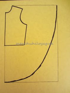 a paper cut out of a dress on top of a piece of yellow paper with black ink