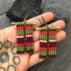 Super fun and colorful macrame earrings. Made with a brass bar, wax string in different colors and brass beads. All put together creating this colorful earrings, that are super light what makes them easy to wear, and easy to match your day by day outfits. You can choose between 2 of them. - The pink one- all pink and burgundy tones with just a touch of green. - The Green onw- all greens burgundy and a touch of white. Two unique pairs. A most have addition to your jewelry collection. To see more Green Macrame Dangle Earrings, Adjustable Macrame Earrings For Jewelry Making, Adjustable Macrame Earrings, Green Macrame Earrings As A Gift, Green Macrame Earrings For Gift, Macrame Dangle Earrings For Gift, Multicolor Macrame Earrings As Gift, Woven Dangle Earrings As Gift, Woven Dangle Earrings For Gift