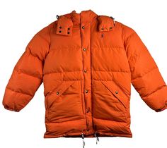 Elevate your winter wardrobe with this Polo Ralph Lauren Boulder Down Puffer Coat Jacket in a vibrant college orange shade. The jacket is made with a softshell fabric type and features zipped pockets, a removable hood, and a full zip closure. The jacket is water-resistant and wind-resistant, making it perfect for outdoor activities like walking and skiing. The jacket is adorned with an embroidered logo and has a chest size of 54 inches, making it a comfortable fit for regular-sized men. The jacket is machine washable and has a long jacket/coat length. The jacket is part of the Polo Ralph Lauren product line and is a classic theme jacket that gives you a stylish and chic look. Sam Core, Softshell Fabric, Long Coat Jacket, Down Puffer Coat, Long Jacket, Classic Theme, Shades Of Orange, Puffer Coat, Chest Size