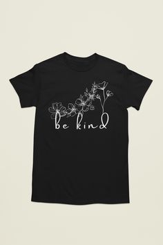 The "Be Kind with Flowers" t-shirt is a charming and inspirational addition to your wardrobe. Crafted from soft, breathable cotton, this shirt features a heartwarming design that encourages a message of kindness. It typically showcases a beautiful flowers, reminding you to spread positivity and goodwill. With its comfortable and relaxed fit, this t-shirt is perfect for individuals who believe in the power of kindness and want to wear their values proudly. Whether you're a nature enthusiast, a lover of flowers, or someone who simply wants to promote a more compassionate world, the "Be Kind" t-shirt is an ideal choice to express your sentiments and add a touch of floral beauty to your style. Flower gift T-shirt, Flower shirt, positive message shirt, gift for mom shirt, Flower lover's shirt, Inspirational Relaxed Fit T-shirt For Spring, Inspirational Letter Print T-shirt For Spring, Spring Text Print Top As Gift, Spring Tops With Text Print For Gift, Text Print Tops As Spring Gifts, Power Of Kindness, Nature Enthusiast, Message Positif, T Shirt Flowers