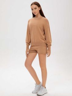 Description Stylish and comfortable, this camel cotton-cashmere loungewear set will have you feeling simultaneously luxurious and cozy. It comes with a chic crew neck relaxed sweatshirt and fitted shorts. This camel crew neck sweatshirt can work for many different occasions. Its luxurious blend of cotton and cashmere creates a feeling of comfort and luxury. The neutral color pairs well with anything. Wear both pieces together to create an effortlessly glamorous loungewear outfit or mix and match Glamorous Loungewear, Cashmere Loungewear Set, Cashmere Loungewear, Loungewear Outfit, Fitted Shorts, Color Pairs, Color Pairing, Loungewear Set, Brown Sweater