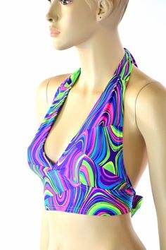 This item is made to order, please read all the way through the listing before purchasing!This neon UV glow worm print halter top ties behind the neck and back for a perfect fit!Darted cups, a wide band below the bust, and crazy bright UV glow!Extra Small: Bust 31"-32" / Waist 24"-25" / Hips 33"-35"Small: Bust 33"-34" / Waist 26"-28" / Hips 36"-37"Medium: Bust 35"-37" /Waist 28"-31" / Hips 38"-40"Large: Bust 39"-41" / Waist 32"-34"/ Hips 41"-43"Extra Large: Bust 42"-44" / Waist 35"-37" / Hips 44 Rave Outfits Festivals, Glow Worm, Music Festival Outfits, Spandex Top, Rave Outfits, Teen Fashion Outfits, Festival Outfits, Spandex Fabric, Tie Back