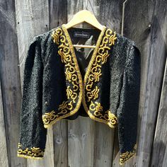 Brand New Black And Gold Bolero Jacket, All Hand Beaded From An Original 90s Designer From Nyc. Received Directly From The Designer While I Was Living In The City. Vintage Embellished Festive Outerwear, Festive Embellished Vintage Outerwear, Vintage Formal Outerwear With Sequins, Festive Vintage Embellished Outerwear, Vintage Sequined Formal Outerwear, Vintage Formal Sequined Outerwear, Vintage Black Embellished Outerwear, Embroidered Fitted Outerwear For Evening, Embroidered Fitted Evening Outerwear