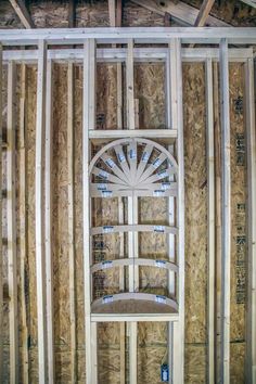 the inside of a house being built with wood framing