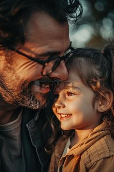 Happy Father and His Daughter Photo, Father's Day Concept, a man and a little girl, likely a father and his daughter, standing close together, with the father holding the daughter in his arms. They are both smiling, creating a warm and affectionate scene that highlights the bond between them. #freepixel #photo #fathersdaycard #happyfathersday #fathersday #fatherlove #fath Greeting Card Design