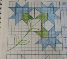 a drawing of a flower on a piece of graph paper