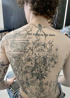 a person with tattoos on their back