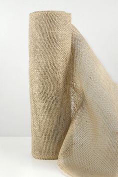 a roll of burlocked jute sitting on top of a white table