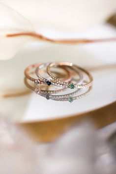 The Pavé Birthstone Stacker is a take on the CTWF classic Birthstone Stacker with a diamond twist. Stack your birthstone, anniversary stone, or a colored stone of your choosing along the pavé diamond band for a hint of sparkle and color. Diamond White Birthstone Jewelry For Promise, Round Diamond Gemstones For Promise Ring, Diamond White Jewelry With Birthstone For Promise, White Birthstone Jewelry For Promise, Diamond Emerald Ring With Pave Setting, Round Emerald Ring With Pave Diamond Setting, Cubic Zirconia Birthstone Jewelry In Round Band, Cubic Zirconia Birthstone Jewelry With Round Band, Diamond Emerald Birthstone Ring For Promise