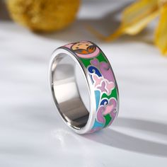 Bring abstract style and an array of colors to your hand, this silver enamel ring has a look all of its own. The cool silver finish is the perfect backdrop to the bold, bright pinks, blues, violet and greens of the enamel insets, giving you a 60’s style with a 21st century twist.Weight: 5.71 gMaterial: Plating Color: Multicolor Enamel Ring For Gift, Multicolor Enamel Ring As Gift, Unique Multicolor Enamel Ring, Multicolor Enamel Ring, 60’s Style, Enamel Ring, Silver Enamel, Abstract Styles, The Cool