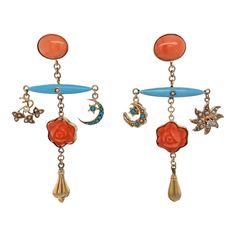 This is part of Chairish’s Fine Jewelry assortment.  A fine pair of Victorian 14K gold repurposed long dangling earrings, c. 1880 - 1900.  The earrings have oval bezel set pierced post tops leading to two Victorian blue enamel lingerie pins with seed pearls. There are additional drops with turquoise and seed pearls. The bottom drops are Victorian repurposed hat pins. Condition is excellent.    Dimensions: Length: 2 1/2", Width: 1 1/4", Weight: 8.2 grams Antiques Repurposed, Jewelry Vendor, Bird Earrings, Hat Pin, Antique Earrings, Seed Pearl, Dangling Earrings, Accessories Jewelry Earrings, Body Jewellery