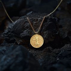 Discover our unique tree of life pendant, a timeless symbol of spirituality and interconnectedness. This pendant is a fine representation of spiritual symbolism and natural beauty. PENDANT INFORMATIONThis pendant is made of real, solid gold.• Made in USA• Material: 14k or 18k solid gold• Finish: polished• Height: 1.1" (28,5 cm) | *includes the small circle, bail dimensions not included• Width: 1" (26 mm)• Pendant weight: approx. 6 grams (14k)• Bail: fits up to 4 mm chains• Solid back, not hollow Symbol Of Growth, Gold Tree Of Life, Phoenix Pendant, Timeless Symbol, Gold Dragon, Gold Tree, Small Circle, Unique Trees, Solid Gold Chains