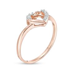 Treat her to a look with a little shimmer and a lot of love. Beautifully crafted in precious 10K rose gold, this simple band is topped with a diamond-lined open heart at its center. Destined to delight with 1/20 cts. of diamonds, this charming ring is finished with a bright polish. Rose Gold Heart Cut Diamond Promise Ring, Rose Gold Diamond Heart Ring For Promise, Rose Gold Open Heart Ring For Anniversary, Rose Gold Heart-shaped Diamond Promise Ring, Heart Shaped Diamond Ring In Rose Gold, Rose Gold Diamond Heart Cut Ring, Heart-shaped Rose Gold Diamond Promise Ring, Heart-shaped Rose Gold Promise Ring, Rose Gold Diamond Heart Ring For Anniversary