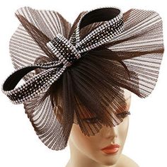 Introducing the Sunday Fascinator 272HB-BRN, a stunning accessory designed to elevate your Sunday attire with a touch of elegance and sophistication. Crafted with care, this fascinator boasts a fashionable brown color that exudes classic charm, making it a versatile addition to any outfit. The eye-catching bow design lies at the heart of this piece, with its expansive loops creating a dramatic visual effect. The loops are accentuated by a sprinkle of shimmering rhinestones, adding a dazzling spa Luxury Church Hat Fascinator, Elegant Brown Mini Hats For Formal Occasions, Elegant Bow Fascinator For Event, Glamorous Fitted Headpieces For Parties, Elegant Brown Mini Hat For Evening, Elegant Headband Fascinator For Kentucky Derby, Elegant Bow Fascinator For Races, Chic Adjustable Fascinator For Evening, Chic Adjustable Fascinator For Evening Events