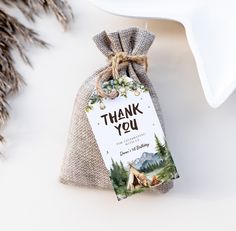 a thank you bag sitting on top of a table