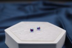 These sparkling gemstone stud earrings are a dazzling and eye-catching accessory, catching the light and reflecting it with every movement. With their shimmering brilliance and elegant design, they add a touch of glamour and sophistication to any outfit. Adjustable Silver Bracelet, Gemstone Stud Earrings, Gemstone Studs, Cz Diamond, Blue Gemstones, Ruby Red, Adjustable Bracelet, Christmas Sale, Gemstone Colors