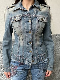 This 2000's denim jacket by iconic Miss Sixty is a stable in everyone's wardrobe. The fit is slim and the color a beige dusty light blue and green denim wash. Condition: this jacket is in a great pre owned condition with no remarks. Size: S Material: 100% cotton Important Information: All orders are shipped within 2-8 business days of purchase with Tracking. A notification email will be sent with tracking when the order has shipped. Once an item has been shipped, Juno Juno is not responsible for 90s Style Spring Denim Jacket With Button Closure, 90s Style Washed Denim Jacket For Spring, 90s Style Denim Jacket With Button Closure For Spring, 90s Style Denim Jacket For Spring, Trendy Fitted Acid Wash Denim Jacket, Fitted Acid Wash Denim Jacket For Spring, Fitted Acid Wash Denim Jacket For Winter, Fitted Washed Denim Blue Denim Jacket, Fitted Long Sleeve Acid Wash Denim Jacket