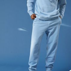 Jogger Sweatpants With Elasticized Waistband And Drawcord In Blue Faded Wash. Slant Side Pockets Back Pocket Cuffed Ankle Outseam Approx 42" 80% Cotton, 20% Polyester Blue Cotton Sweatpants With Ribbed Cuffs, Blue Relaxed Fit Bottoms With Ribbed Cuffs, Blue Bottoms With Ribbed Cuffs And Relaxed Fit, Blue Sweats With Pockets And Relaxed Fit, Blue Relaxed Fit Sweats With Pockets, Blue Relaxed Fit Sweatpants With Ribbed Waistband, Blue Relaxed Fit Joggers With Ribbed Waistband, Blue Joggers With Ribbed Waistband And Relaxed Fit, Blue Relaxed Fit Pants With Ribbed Cuffs