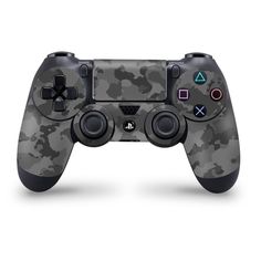 an image of a controller for a video game system with camouflage pattern on the side