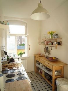 the kitchen is clean and ready to be used for cooking, baking, and eating