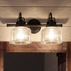 A beautiful bathroom light fixture with two glass shades. Chic Bathroom Vanity, Industrial Bath, Bathroom Industrial Chic, Industrial Bathroom Lighting, Luxury Industrial, Bronze Bathroom, Industrial Bathroom, Bathroom Vanity Light, Industrial Farmhouse