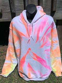 I'm always trying to come up with something new. I accidentally did this one and thought what the heck lol I'll post it. LOL.  I actually really like this simple little tie dye hoodie. I hope you do too.  Each hoodie is 50% cotton and 50% poly.  I use mens hoodies bc they are more roomy and comfortable.  WASHING INSTRUCTIONS: wash as normal in cold water. Tumble dry on low or simply hang to dry.  Have a custom order? Send me a msg and I'll see what I can come up for you.  Thanks for stopping by my shop. I hope you find something you like! :) Acid Wash Hoodie With Relaxed Fit For Spring, Acid Wash Relaxed Fit Hoodie For Spring, Trendy Acid Wash Sweatshirt With Drawstring Hood, Trendy Acid Wash Long Sleeve Hoodie, Trendy Multicolor Cotton Sweatshirt, Spring Hand-dyed Tie Dye Sweatshirt, Tie-dye Hoodie With Drawstring Hood, Acid Wash Hooded Hoodie For Spring, Tie Dye Cotton Top With Drawstring Hood