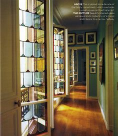 the front cover of an architectural magazine, featuring stained glass windows and wood flooring