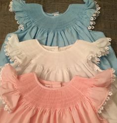 Bishop style bubble. Ready to smock with your own design. Colors available are white and light blue. I am in the process of making the pink bubble. Sizes in pink and light blue are: NB 3M 6M 12M Lighat blue 12M White Size12M Size 18M Size 24M For custom orders allow 3-4 weeks for delivery. Cute Pink Smocked Top With Ruffles, Cute Pink Ruffled Smocked Top, Pink Cotton Smocked Top With Smocked Back, Pink Smocked Dress For Baptism, Cute Pink Cotton Smocked Top, Pink Cotton Smocked Short Sleeve Top, Pink Cotton Short Sleeve Smocked Top, Cute White Smocked Dress For Baptism, Pink Short Sleeve Smocked Top