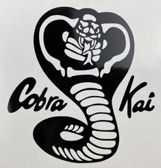 the cobra logo is shown in black and white