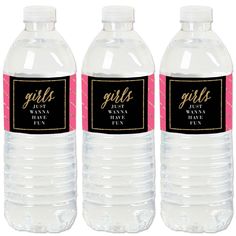 three bottles of water with pink ribbon around the top and black label on each bottle