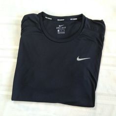 Excellent gently used pre-owned condition with minimal signs of wear and tear as seen in images. Moisture-wicking Dri-fit Tops For Streetwear, Moisture-wicking Tops For Streetwear, Black Crew Neck Tops For Light Sports, Casual Black Tops For Light Sports, Nike Dri-fit Athletic Fit Tops, Nike Athletic Fit Dri-fit Tops, Sporty Dri-fit Tops For Streetwear, Black Dri-fit Tops For Streetwear, Casual Dri-fit Tops For Workout