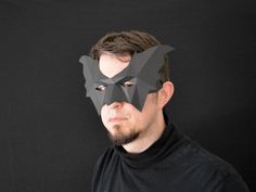 Make your own bat wings mask from paper, card stock, or cardboard with this PDF template!  Need a Halloween mask? Grab some paper and you're good to go! Sized for an average adult. Child size also included*. Paint the finished mask however you like to create your personalized project. Approximate Dimensions (adult):  6.5 in. tall, 10.5 in. wide, and 5 in. front to back Difficulty Level: Easy-Medium Pages: 2 This purchase is for the pattern and instructions only. You will need card stock or other material, access to a printer, scissors or a craft knife, and glue or tape. The pattern will be available immediately for download once you finish your purchase. * Child size is appropriate if the circumference around the head above the eyebrows is less than 20 in (51 cm). If you have other questio Mask From Paper, Bat Diy, Big Eyelashes, Mask For Halloween, Bat Mask, Craft Knives, Halloween Mask, Halloween Inspo, Diy Pattern